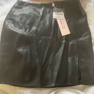 Black faux leather mini skirt